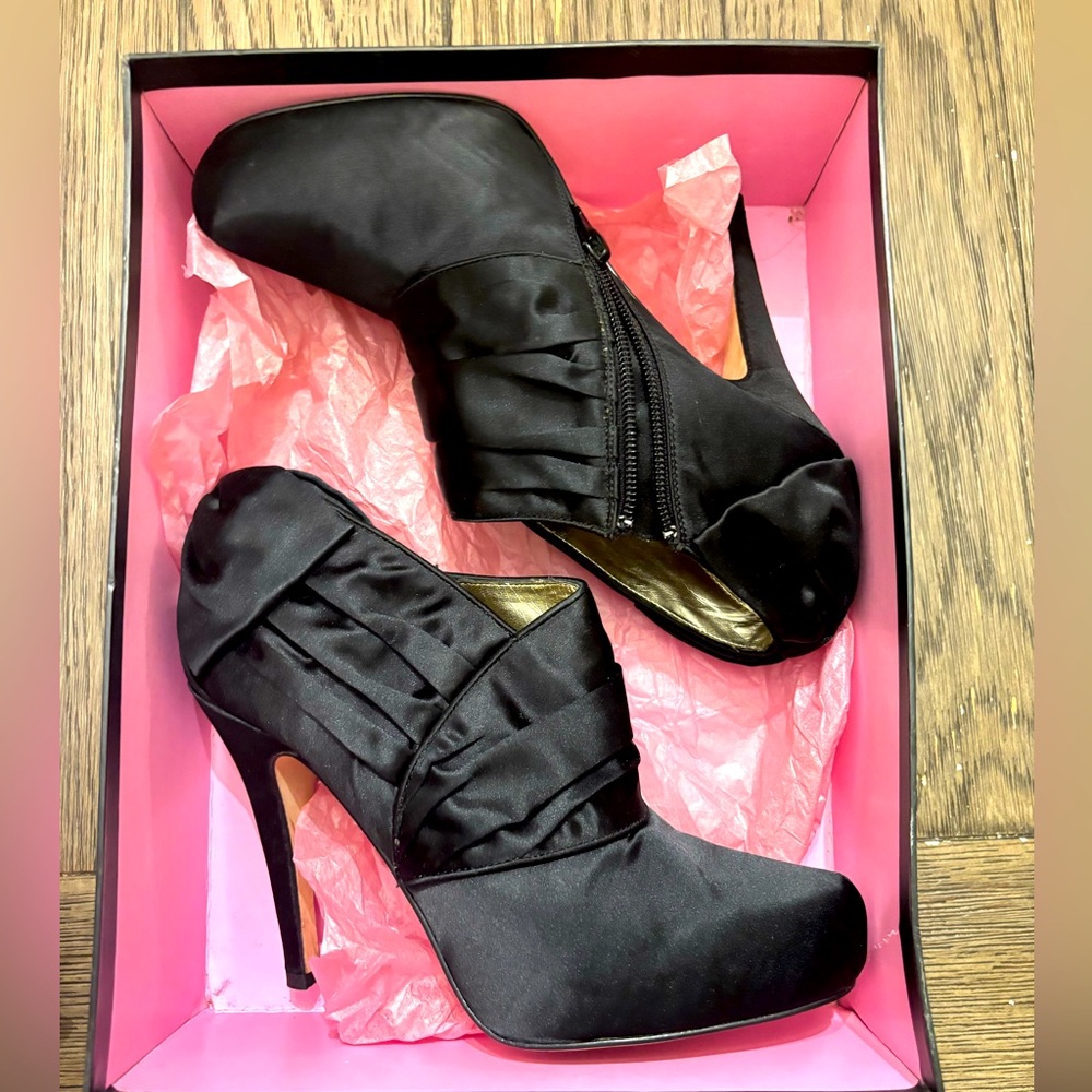 Liked New- Black Satin heels boots from Steve Madden